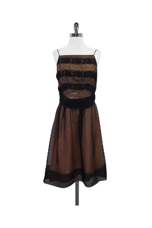 Ruffled Women Dress with Multiple Layers for a Playful and Girly Style Ruffled Women Dress with Multiple Layers for a Playful and Girly Style Laundry by Shelli Segal - Tan & Black Silk Spaghetti Strap Dress Sz 10
