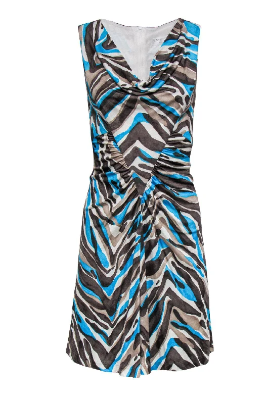 Backless Women Dress for a Sexy and Alluring Look at Evening Events Backless Women Dress for a Sexy and Alluring Look at Evening Events Trina Turk - Brown, Blue & Beige Silk Printed Ruched Dress Sz 4